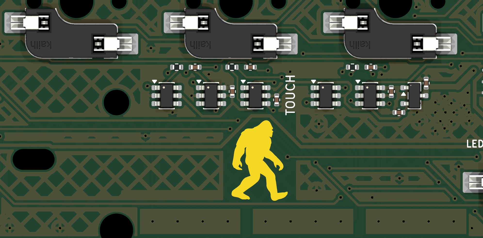The walking mark printed in gold on the k60 board, beside the small chips of the touch knob